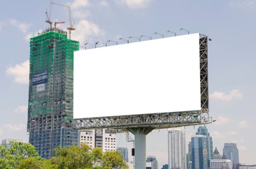Obraz premium large blank billboard on road with city view background
