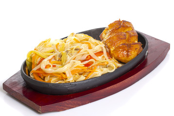Asian thai udon noodles with grilled chicken fillet isolated