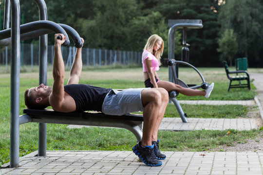 People Training On The Outdoor Gym