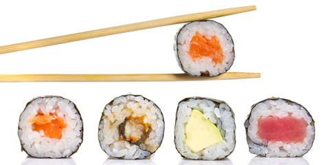 Little sushi maki roll with chopsticks isolated