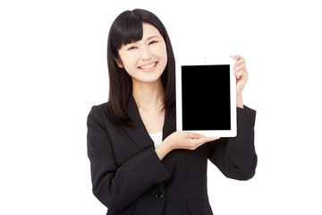 Naklejka premium タブレットを持って笑うビジネスウーマン