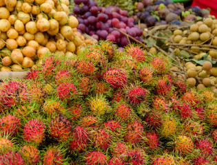 Sweet fruits rambutan in the market