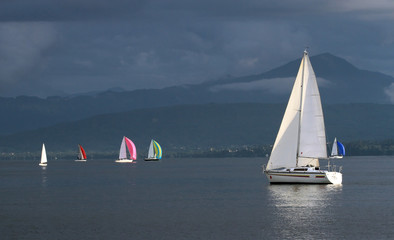 Sailing boats by stormy weather, Geneva lake, Switzerland