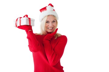 Festive blonde holding a present