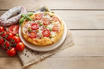 Italian cuisine: pizza with salami