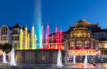 Fototapeta na wymiar Night view of colorful fountain in Sopot