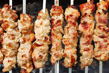 skewers with meat shish kebabs on brazier