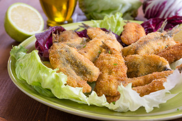 Sardine panate e fritte, fried and breaded sardines