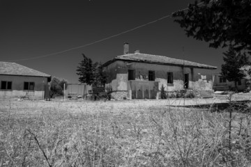 Fototapeta na wymiar Abandoned house in the village. Black and White. Turkey
