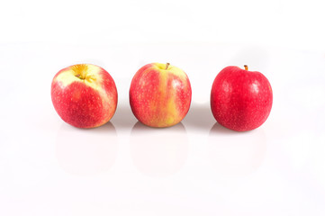 Red apples on white background