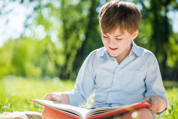 Boy in summer park