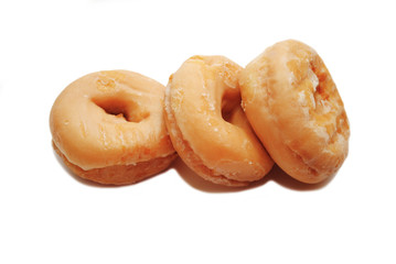 Three Glazed Doughnuts Isolated on a White Background