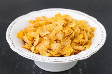 flakes in white dish