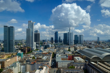 Fototapeta na wymiar Skyline of Frankfurt under a partly cloudy sky