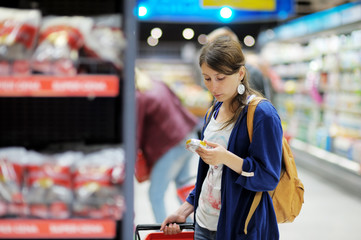 Young woman at supermarket