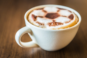 Soccer latte coffee