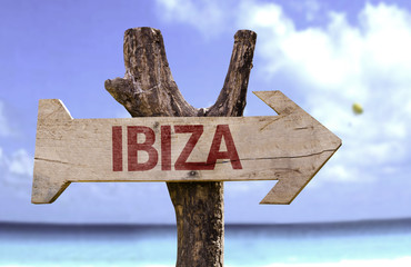 Ibiza sign with a beach on background - obrazy, fototapety, plakaty