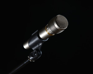 Microphone isolated on black background