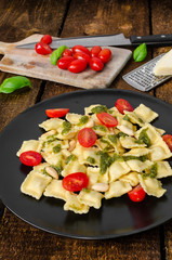Home made ravioli with basil pesto
