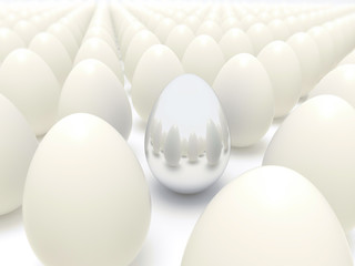 Silver egg in rows of normal eggs - Business Easter time concept
