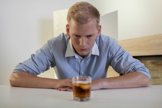 Businessman struggling with alcoholic problem