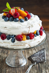 Meringue cake with fresh berries. Pavlova cake