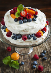 Meringue cake with fresh berries. Pavlova cake