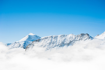 Plakat Snow Mountain Range Landscape with Blue Sky from Jungfrau Region