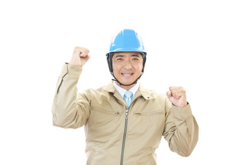 ガッツポーズの労働者