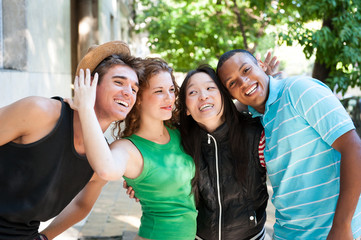 Multi-ethnic group of succesful adults.