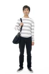 Full body Happy young man standing with handbag,