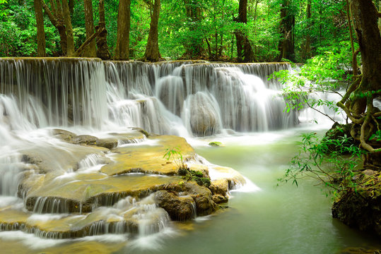 Waterfall in tropical deep forest at Huay Maekhamin