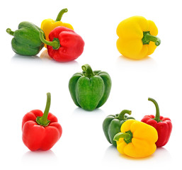 red green yellow pepper on white background
