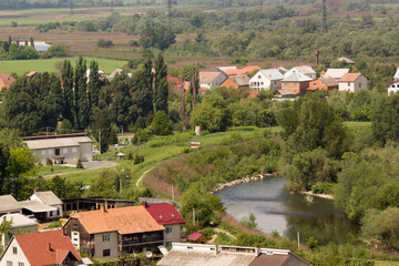 Fototapeta na wymiar Houses by the river Latorytsa in Mukachevo