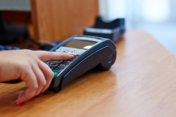 Woman pay by credit card