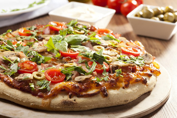 Pizza with ham and mushrooms