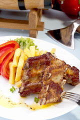 Grilled ribs on plate