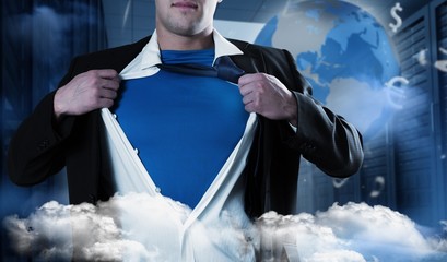 Composite image of businessman opening his shirt superhero style