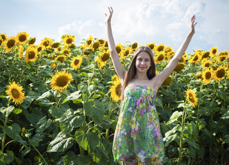 Beautiful girl with sunflower