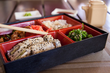 Boxing with Japanese food.