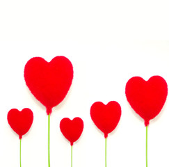 Fototapeta na wymiar 4 red hearts on white backgroun