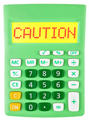 Calculator with CAUTION on display isolated on white background