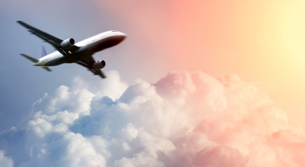 .Airplane above the clouds