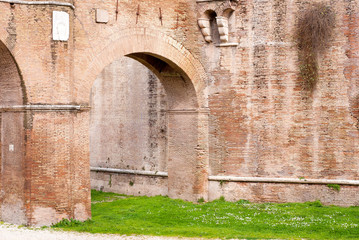 Antique brick passage in Rome, Italy