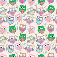 Seamless vector background with colorful funny owls