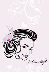 Beautiful woman with orchid in hair. Coloring hairstyle