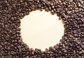 Coffee beans on the gold background