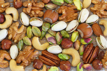 Selection of nuts, almonds and sultanas, close up
