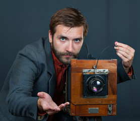 photographer with an old camera