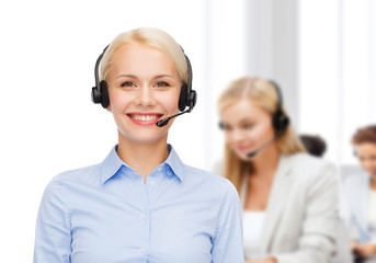 friendly female helpline operator with headphones